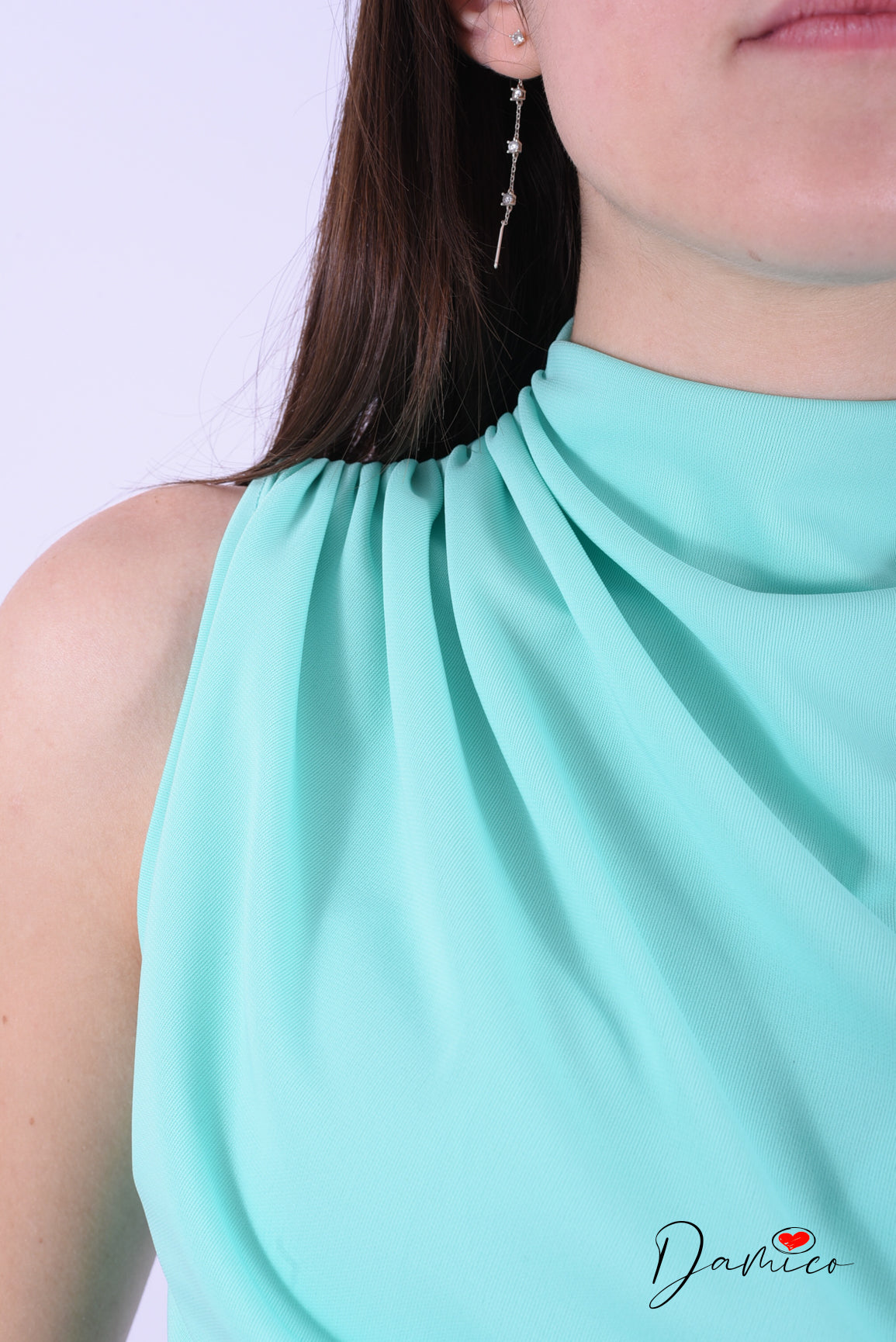 Blusa smanicata drappeggiata