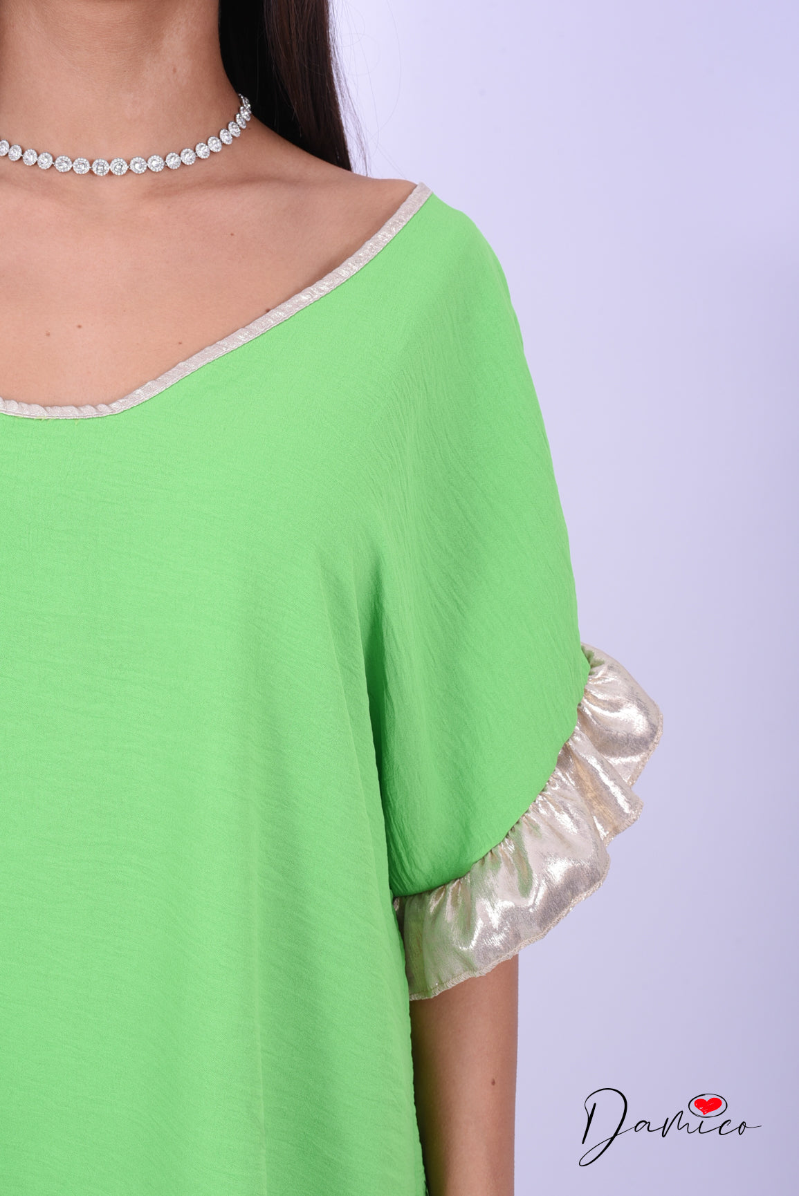 Blusa over con bordino