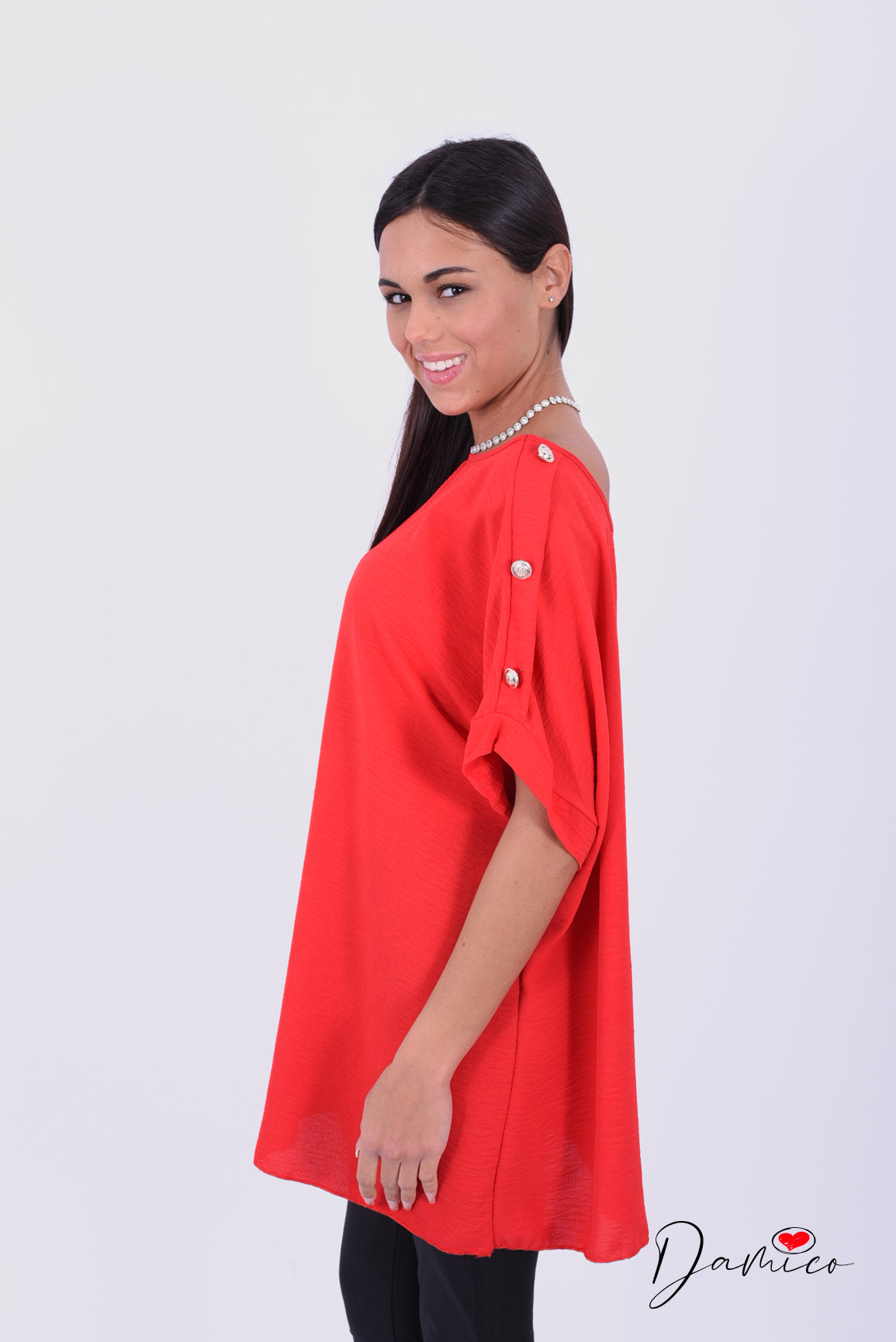 Blusa bottoncini oro