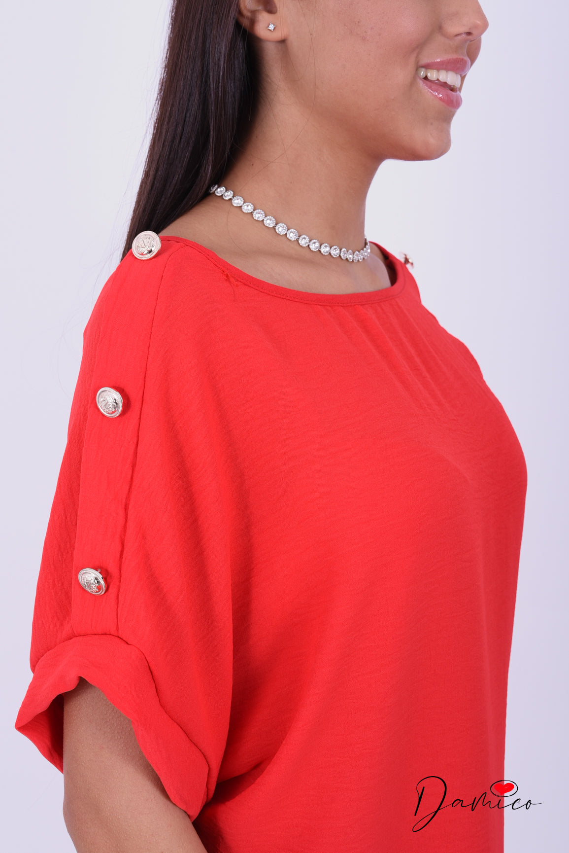 Blusa bottoncini oro