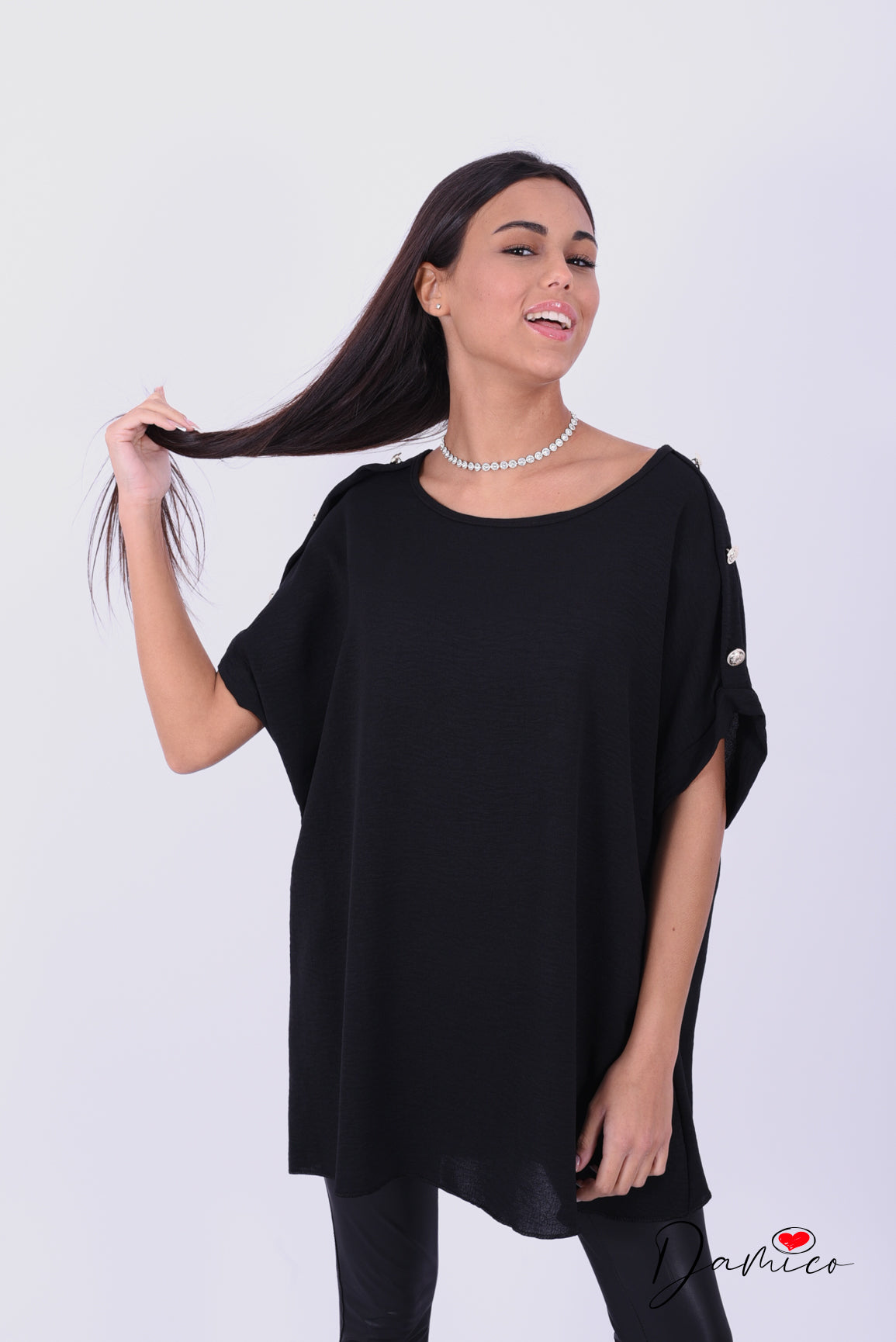 Blusa bottoncini oro