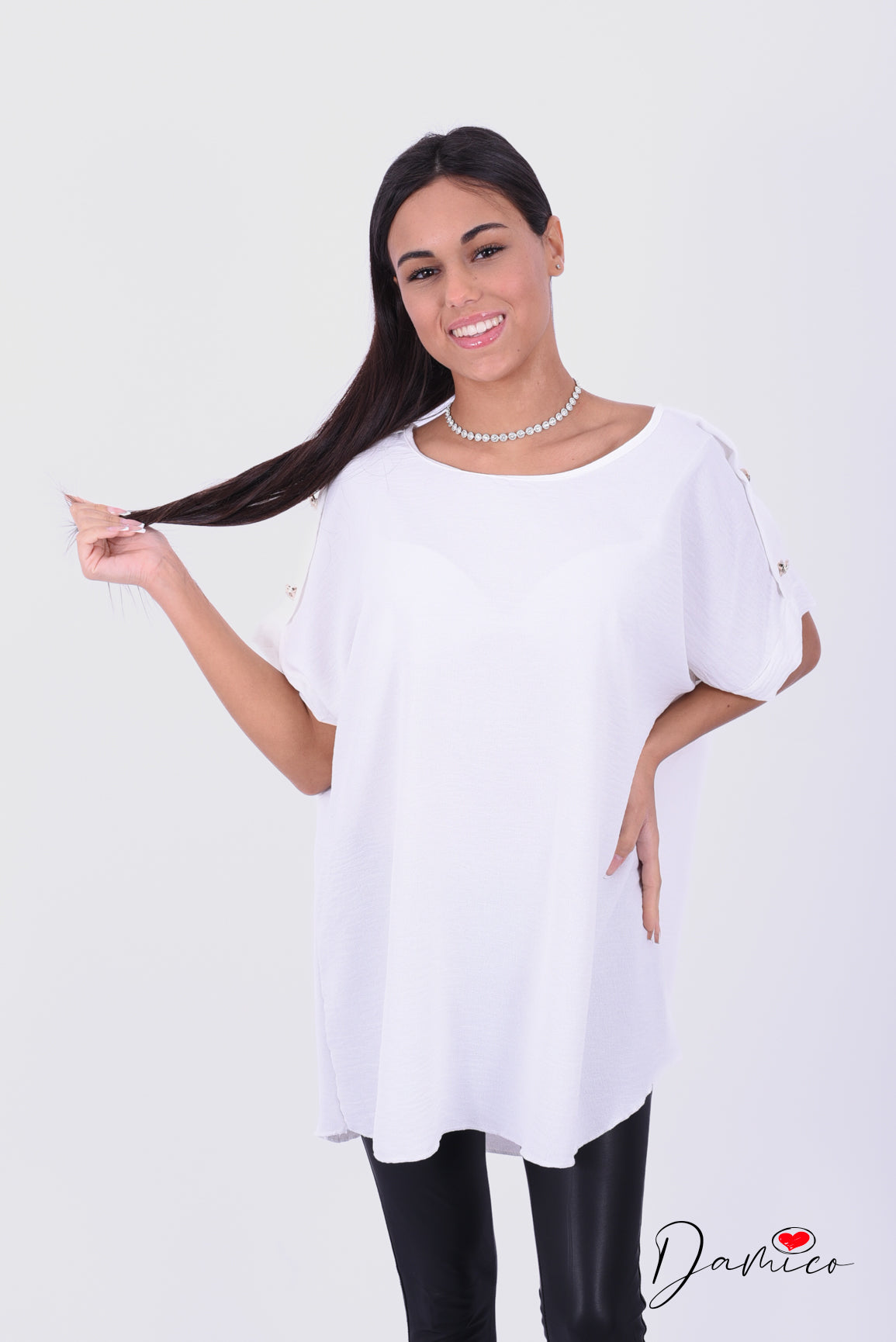Blusa bottoncini oro
