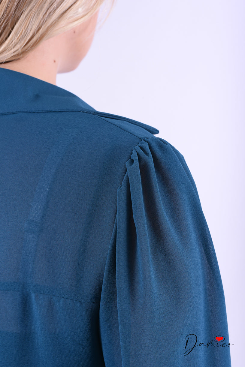 Blusa con fiocchetti