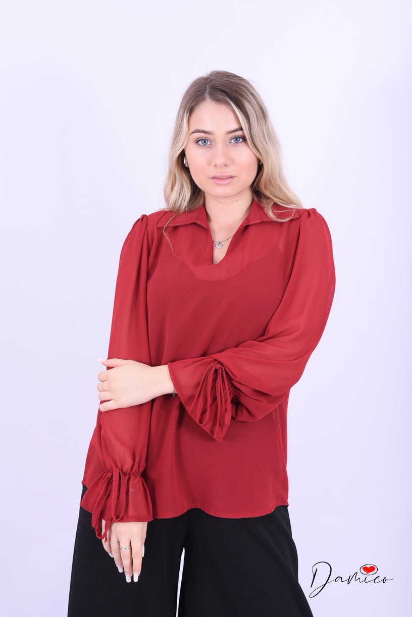 Blusa con fiocchetti
