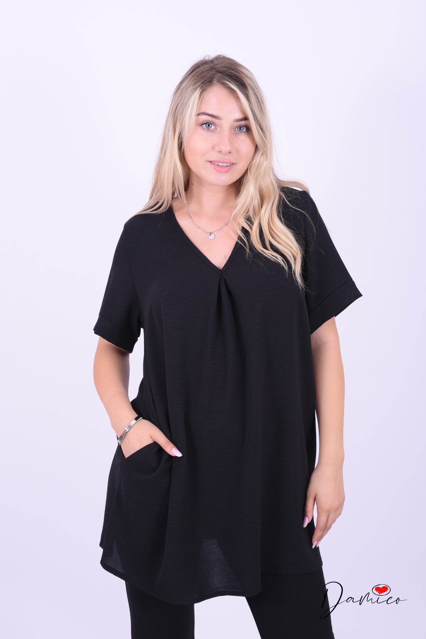 Blusa large scollo a V