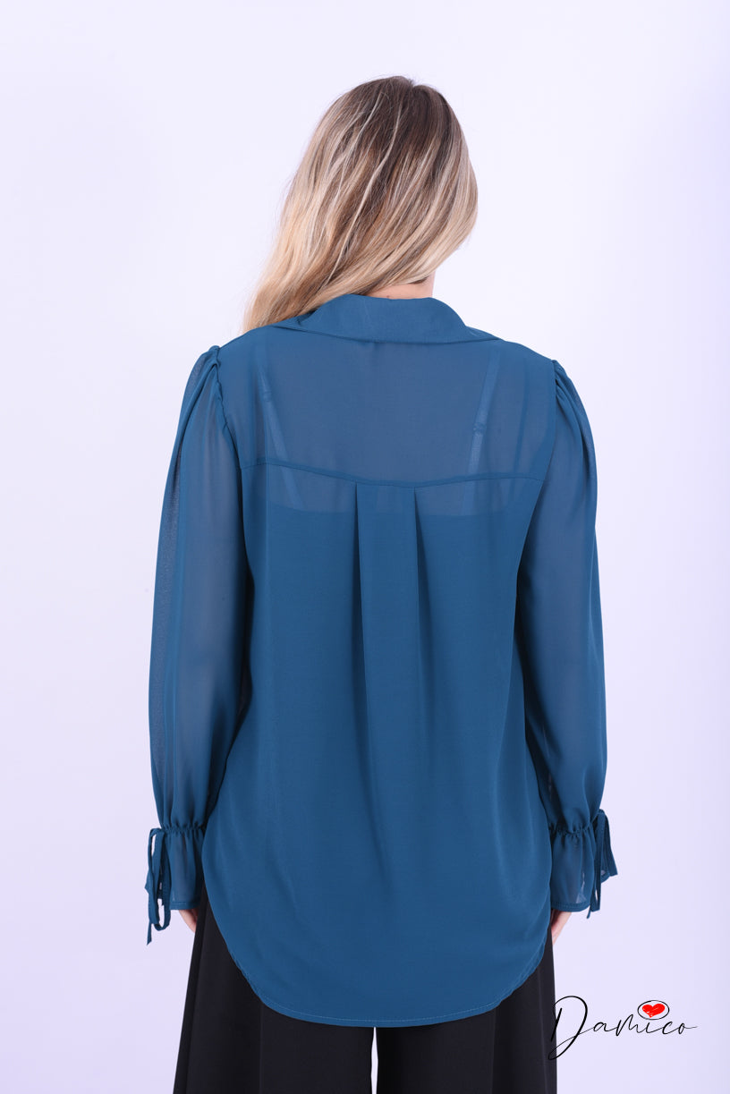Blusa con fiocchetti