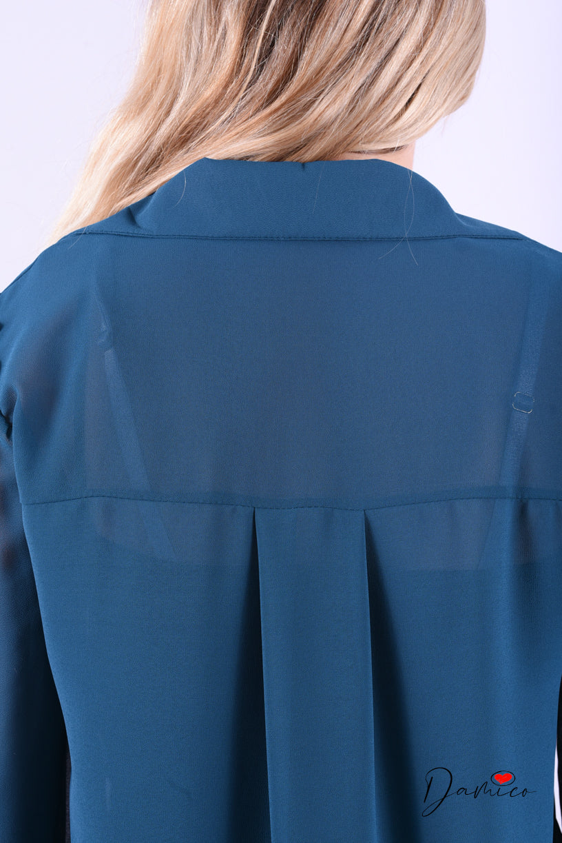 Blusa con fiocchetti