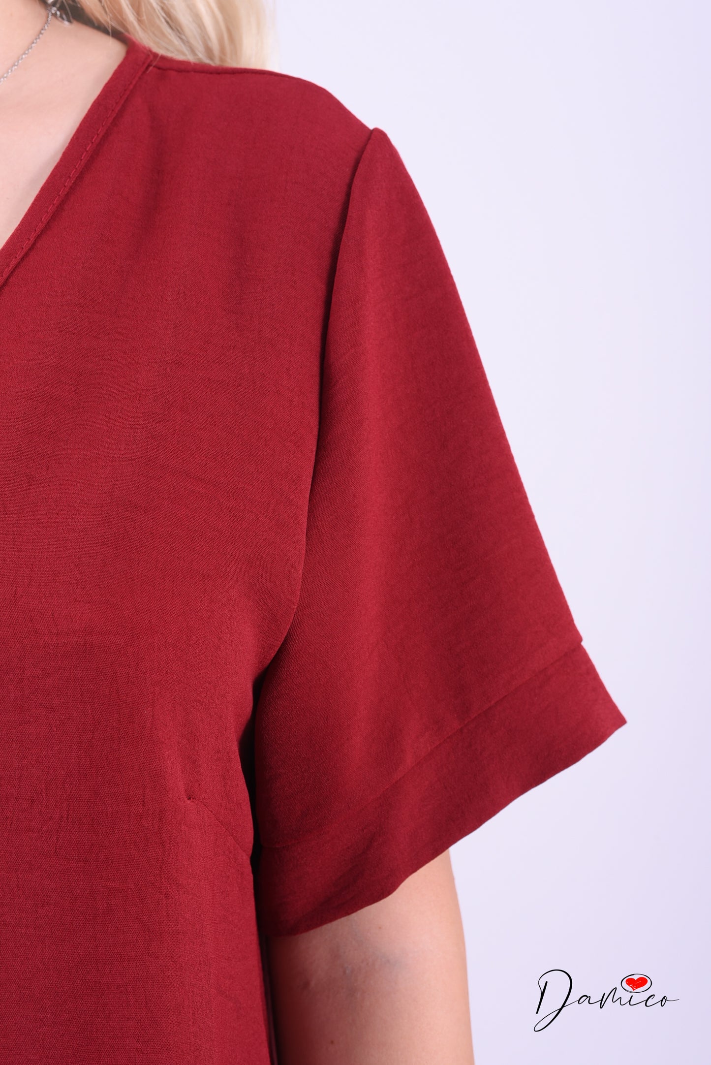 Blusa large scollo a V