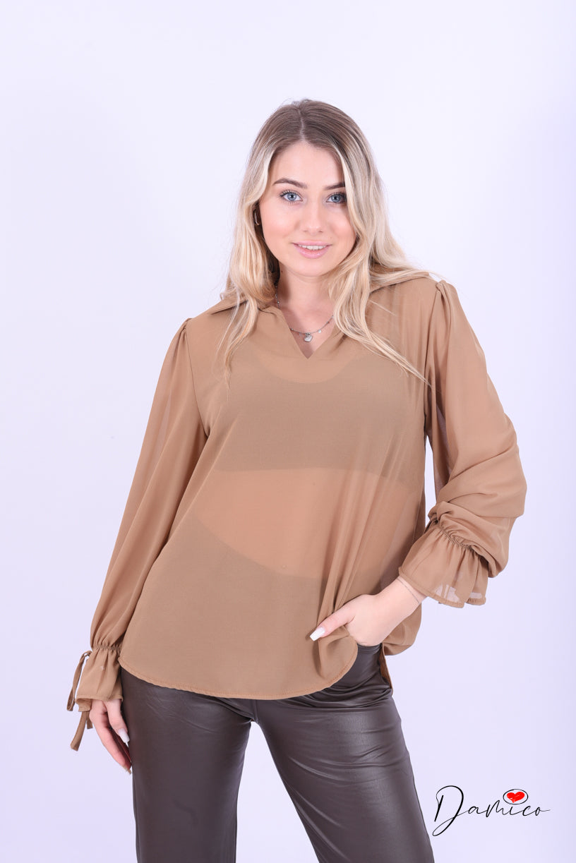 Blusa con fiocchetti