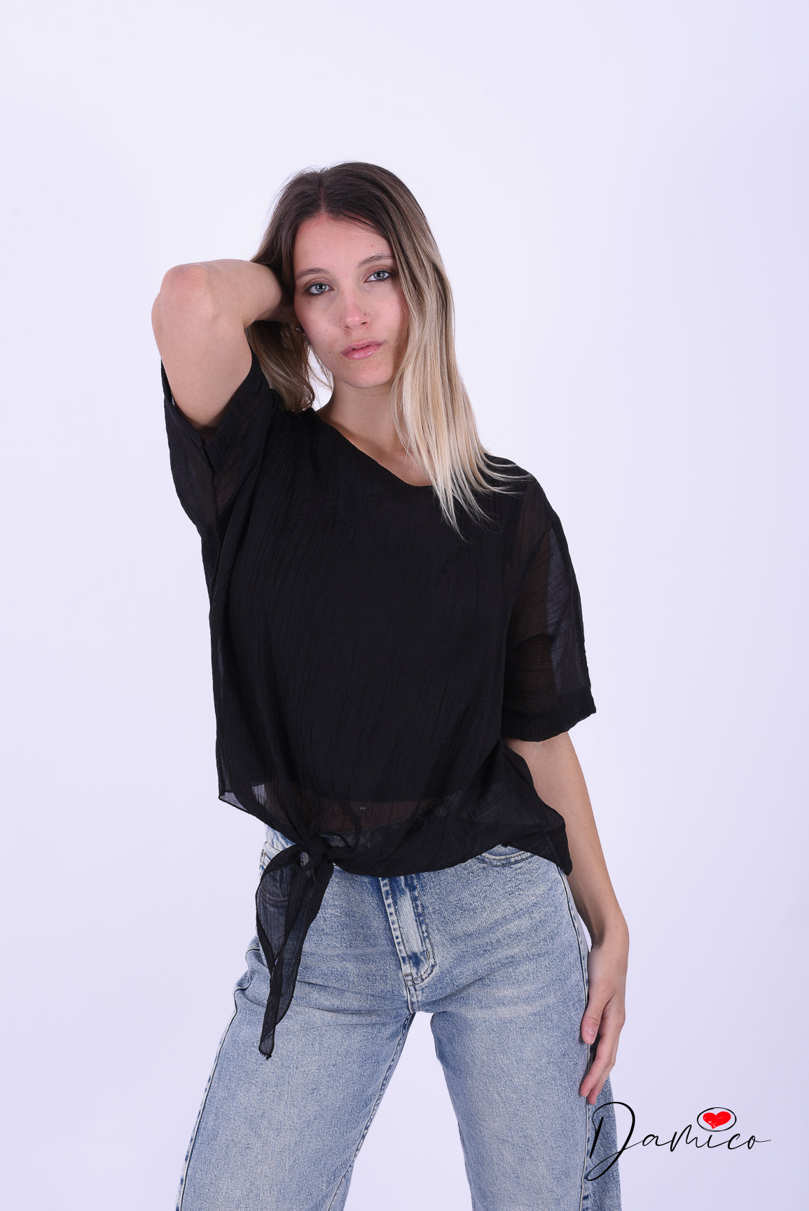 Blusa pipistrello rigata