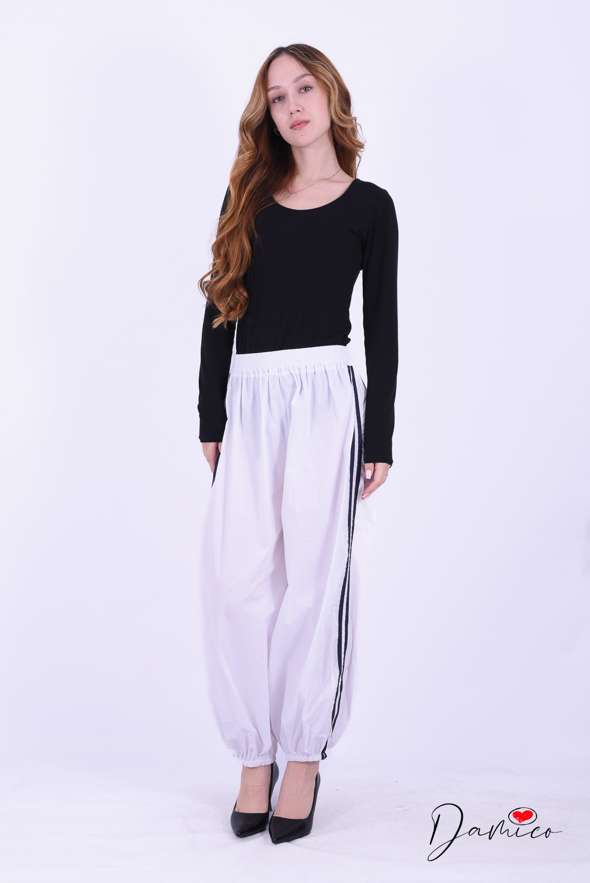 Pantaloni sportivi con polsino e bande tc