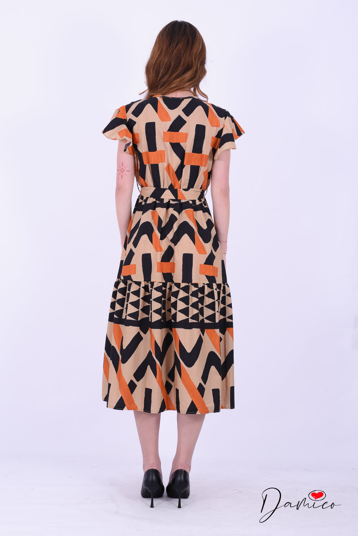 Abito manica ad aletta geo