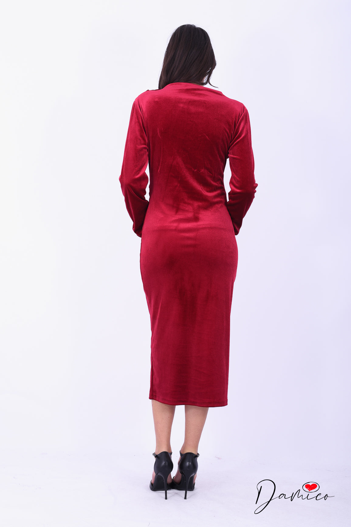 Abito vellutato con drappeggi