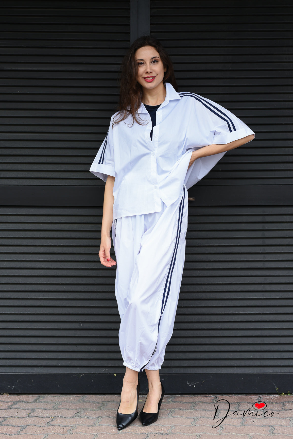 Pantaloni sportivi con polsino e bande tc