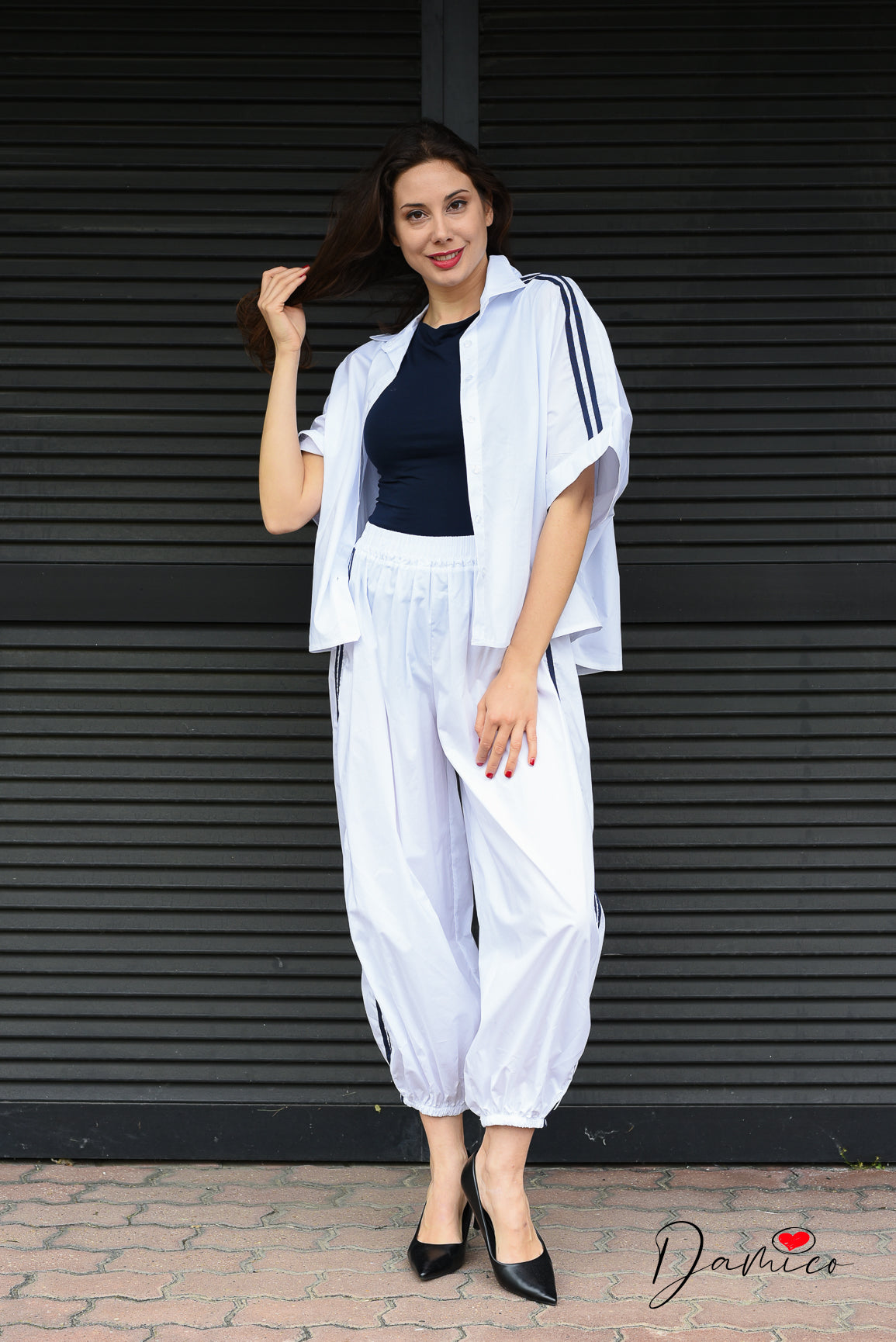 Pantaloni sportivi con polsino e bande tc