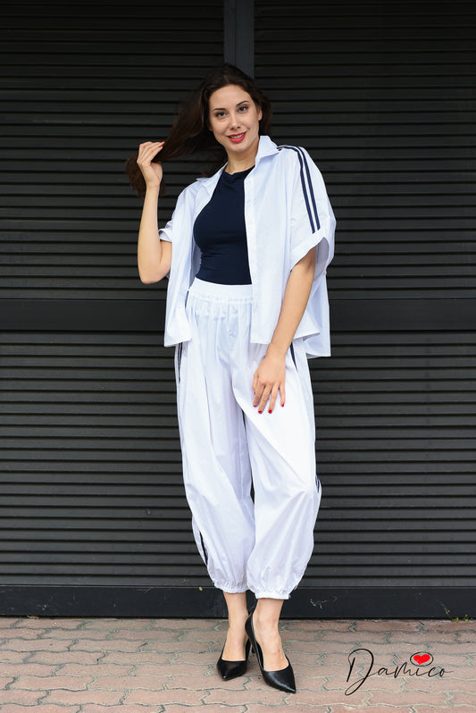 Pantaloni sportivi con polsino e bande tc