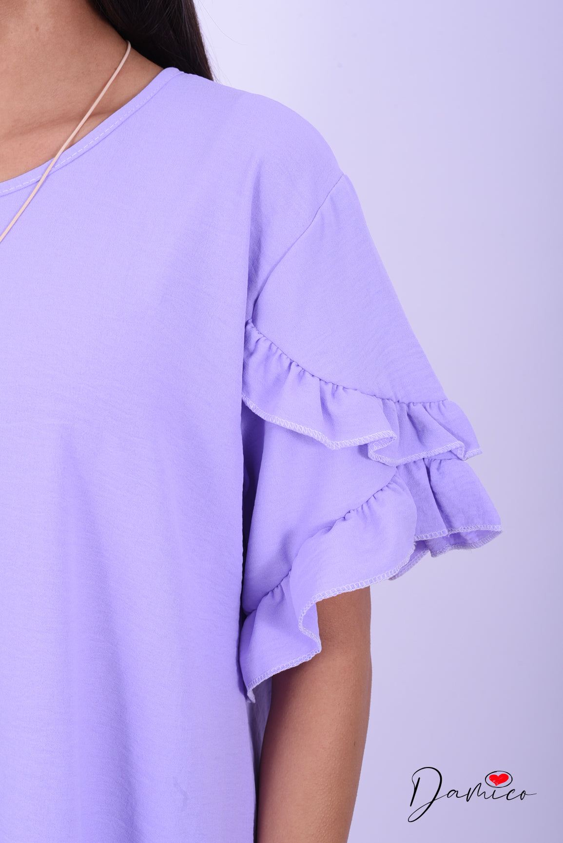 Blusa con collana