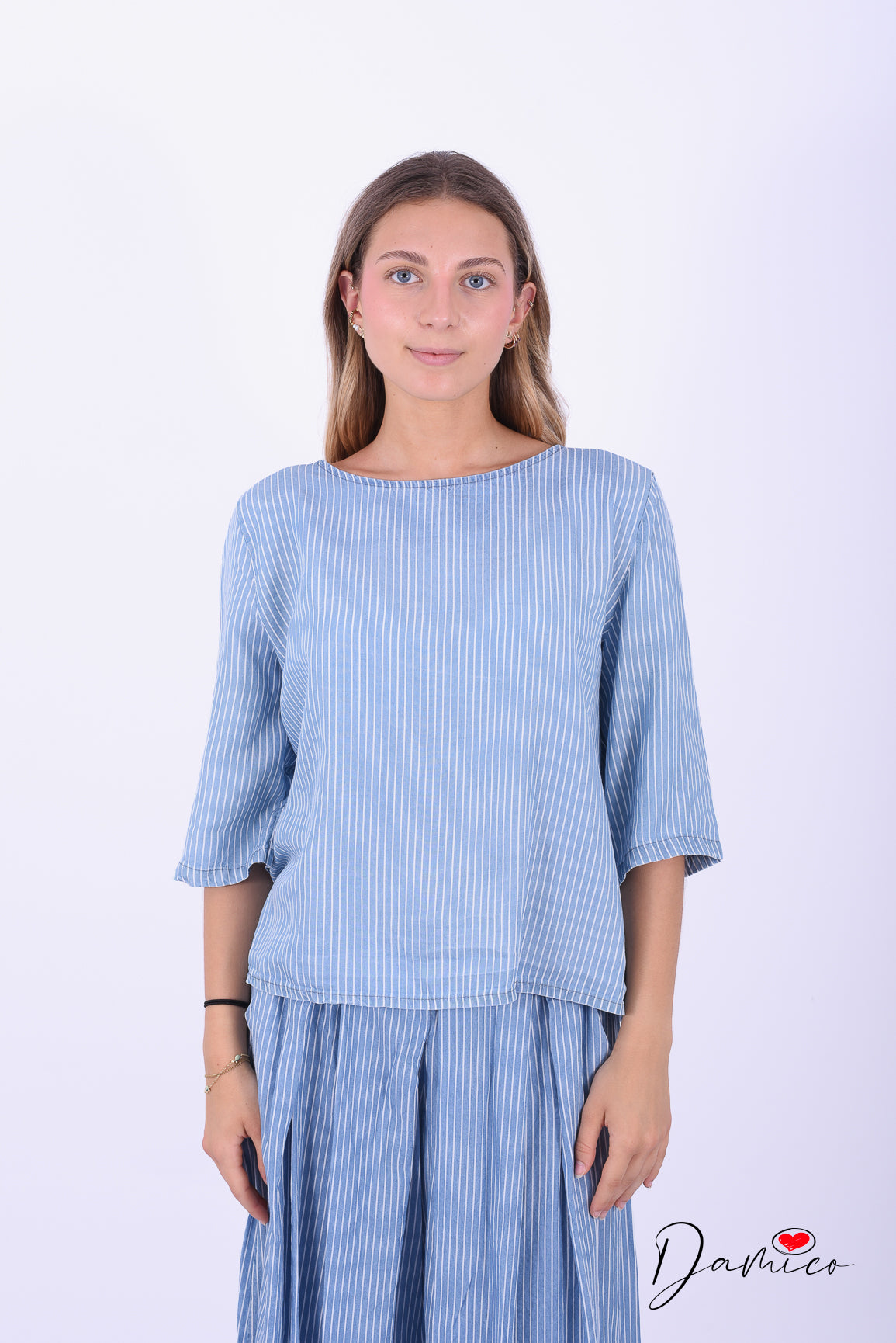 Blusa mc gessato bottoncini sul retro